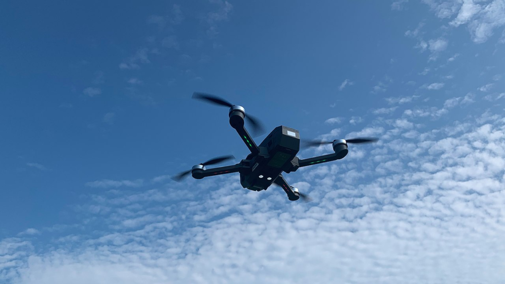 an UAV drone flying in the sky